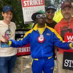 Flavor Flav Delivers Pizza, Burgers and Support to Striking WGA Writers