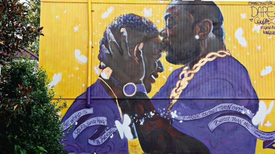 North Carolina Artist Paints Mural of Busta Rhymes Embracing Son to Reveal the Beauty of Black Fatherhood