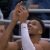 Giannis Antetokounmpo Scans QR Code With Mobile Phone To Get Free Chicken Wings From Wingstop